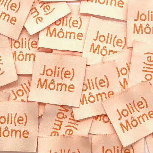 Étiquette à coudre : JOLI(E) MÔME Saumon