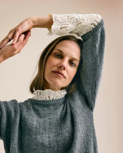 N°276 : Femme Tricot Fils Piliers